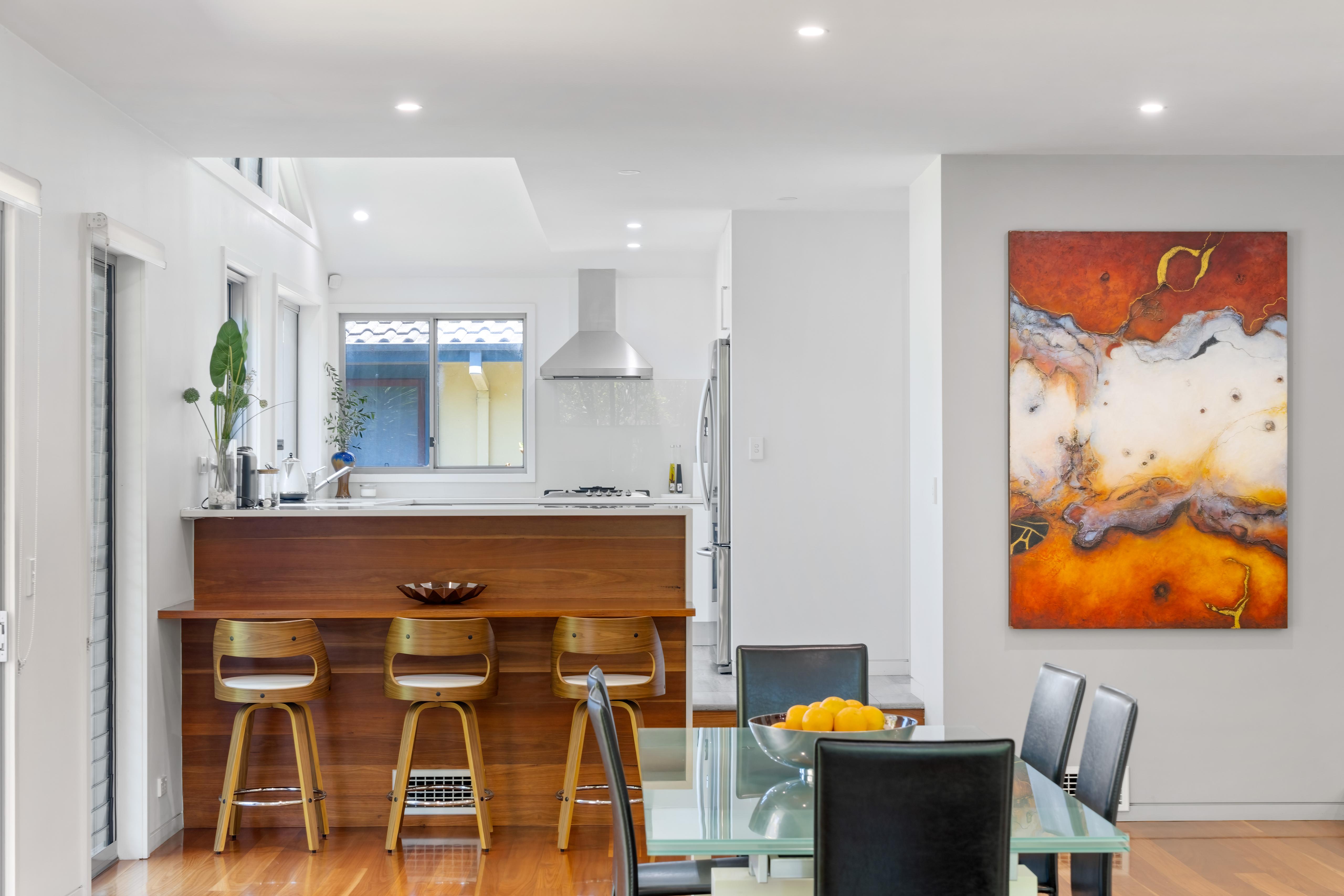 Kitchen interior painting with timber island bench — North Shore Painting
